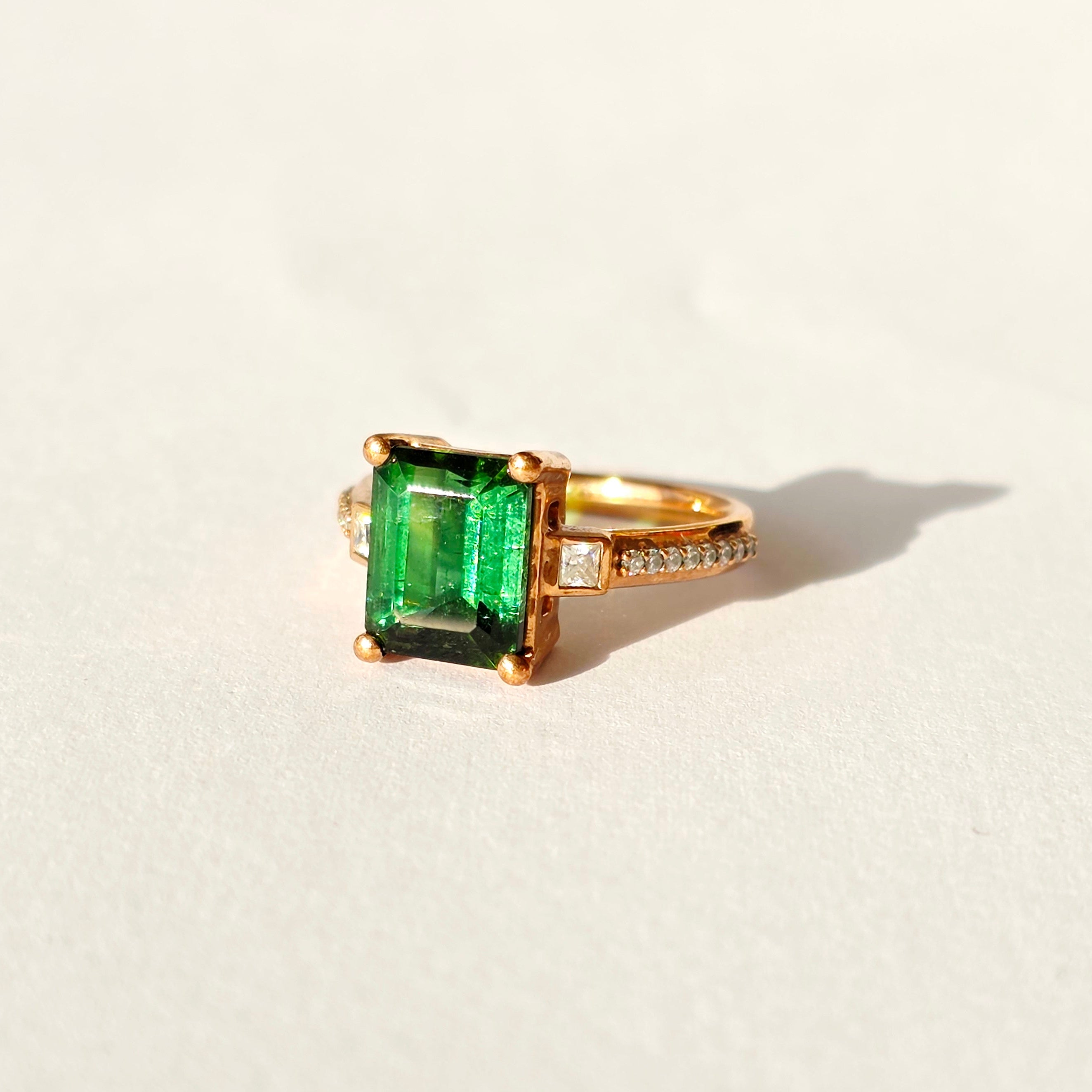 Green-tourmaline-rose-gold-emerald-cut-moissanite-solitaire-engagement-ring-7