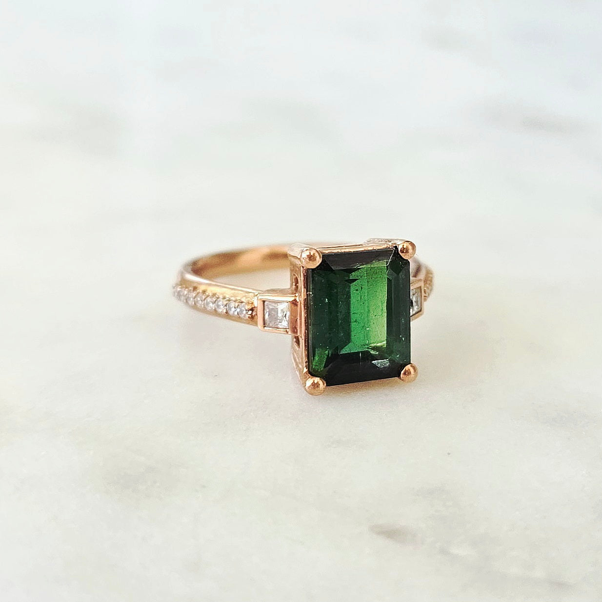 Green-tourmaline-rose-gold-emerald-cut-moissanite-solitaire-engagement-ring-5