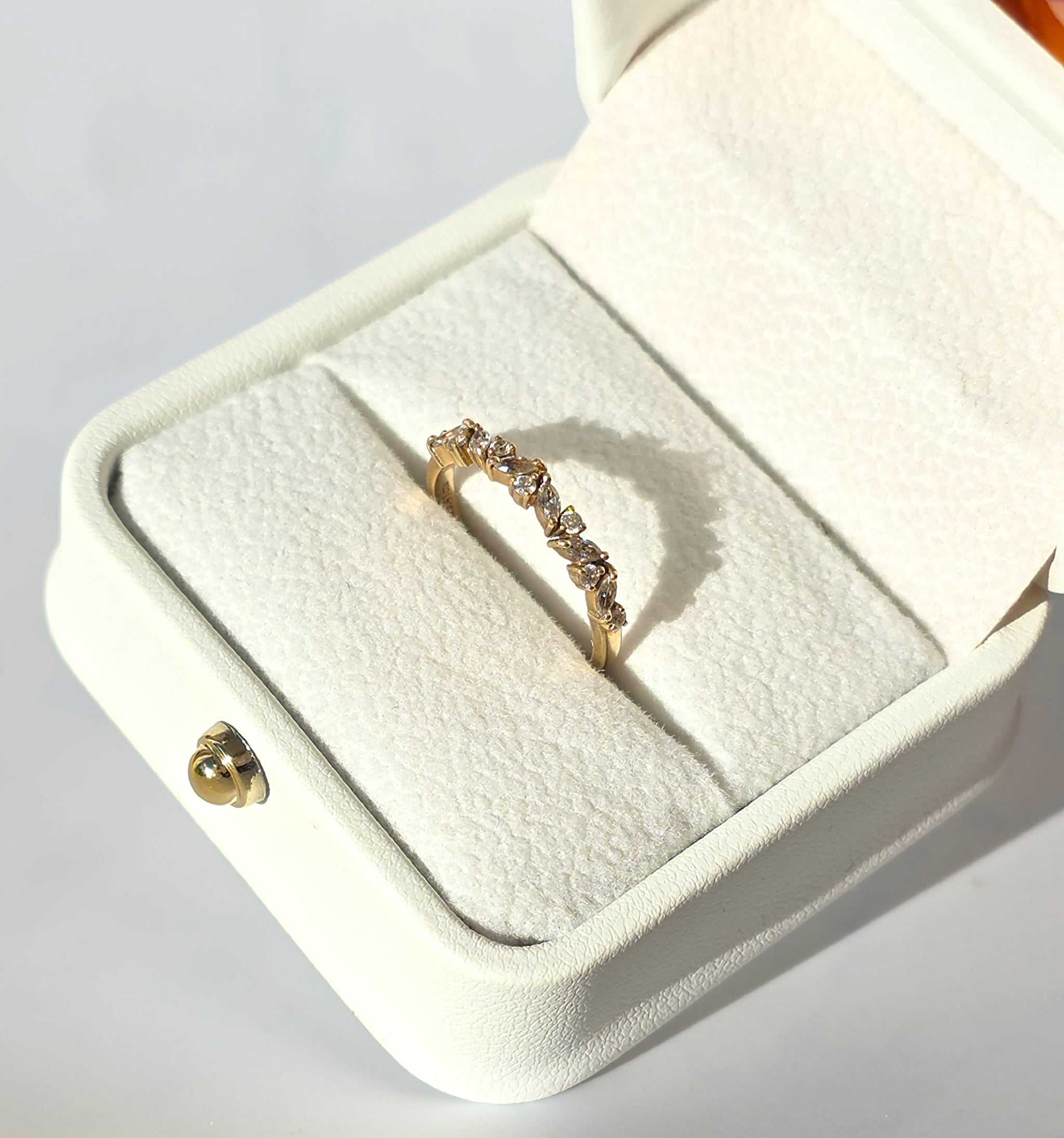 Lyria-marquise-curve-ring-10k-yellow-gold-round-marquise-moissanite-eterling