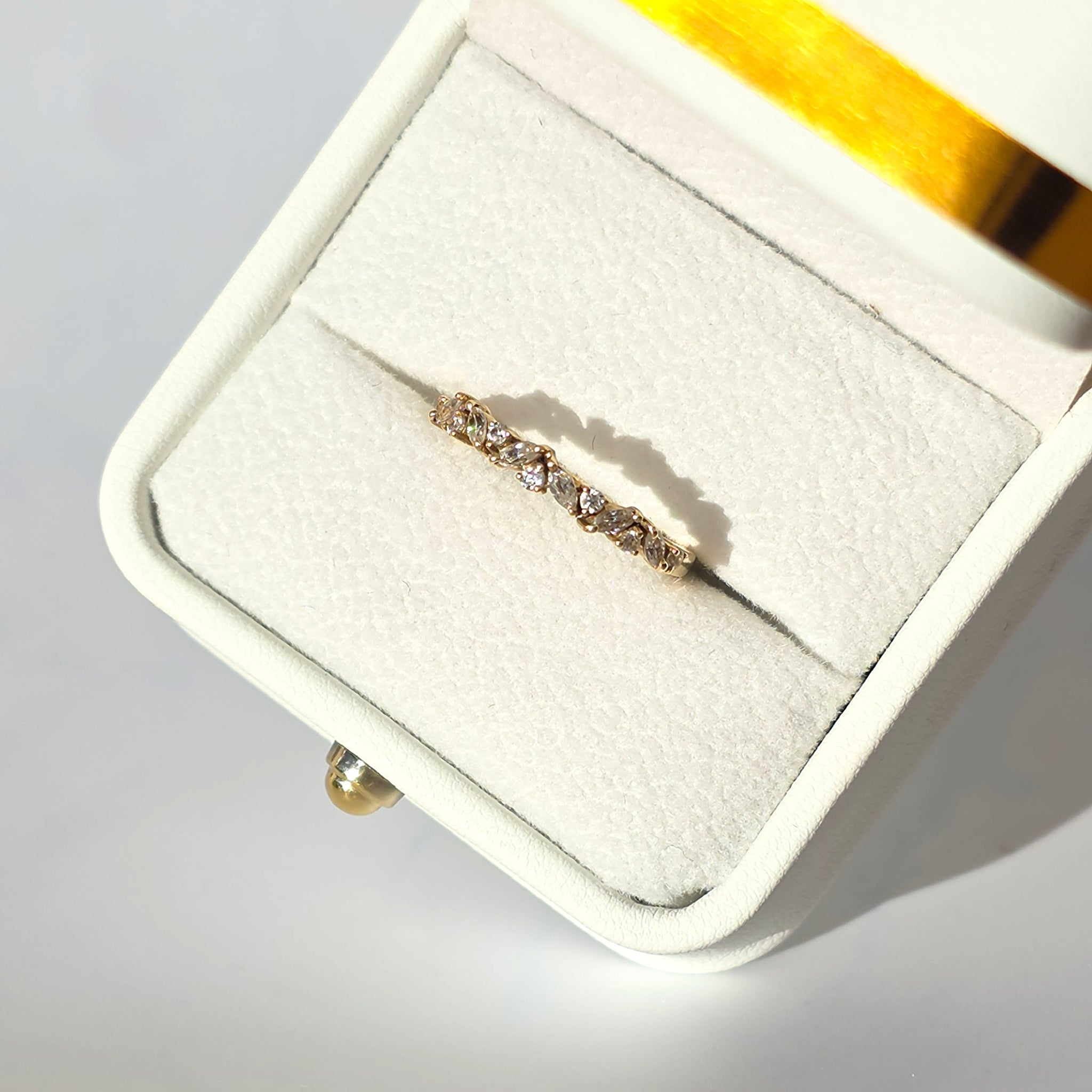 Lyria-marquise-curve-ring-10k-yellow-gold-round-marquise-moissanite-eterling