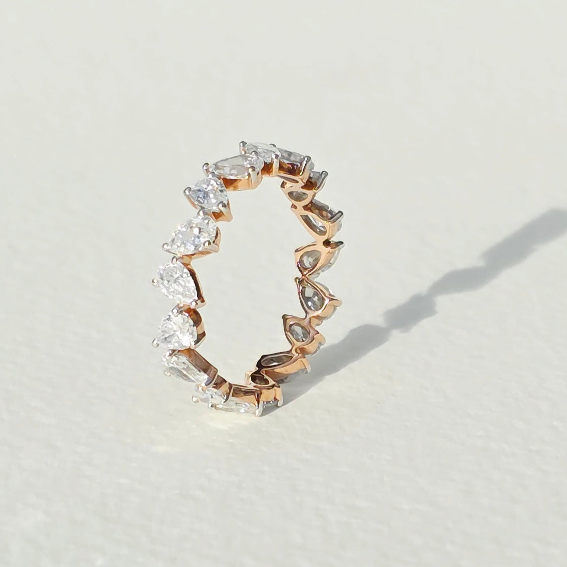elara-ring-14k-rose-gold-pear-cut-lab-diamond-eternity-band