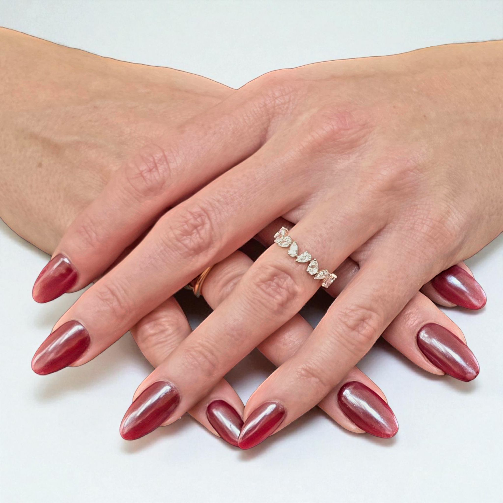 elara-ring-14k-rose-gold-pear-cut-lab-diamond-eternity-band (1)