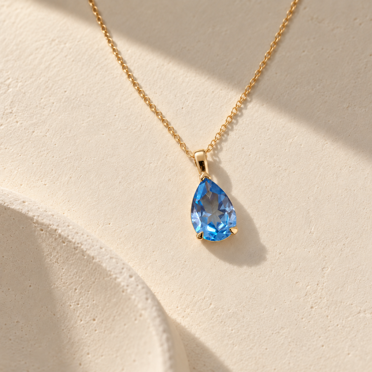 Clara Blue - Pear-Cut Topaz Necklace in Yellow Gold