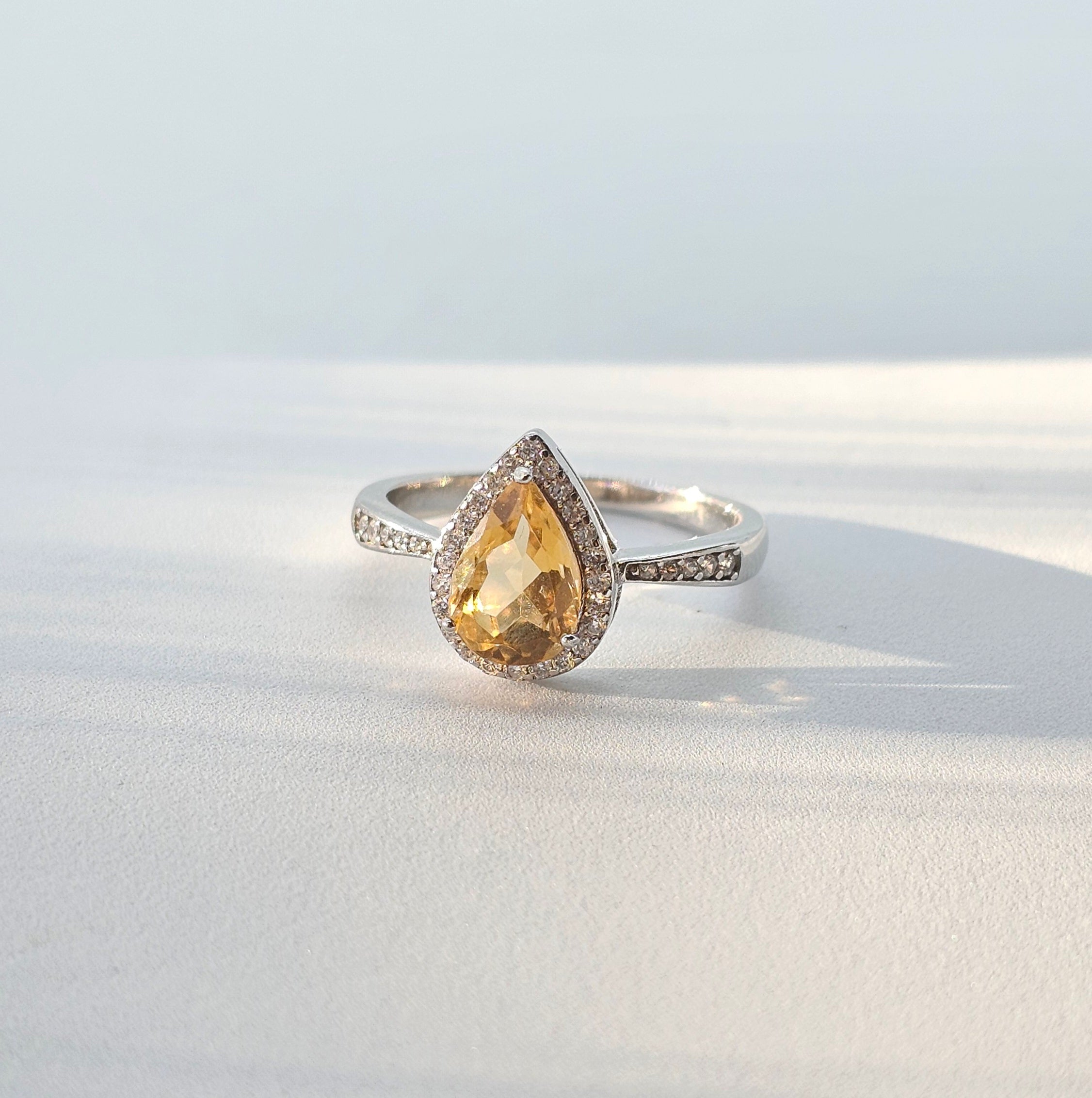 pear-citrine-halo-ring-sterling-silver-luminous-joy-abundance-eterling