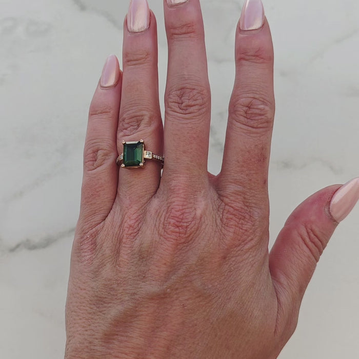 Green-tourmaline-rose-gold-emerald-cut-moissanite-solitaire-engagement-ring-vid