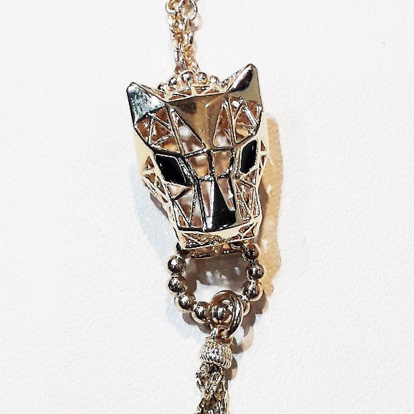 The panther is a symbol of power, beauty, grace and elegance. Our outstanding panther shape geometric-cut solid-gold necklace with mesmerizing white topaz gemstones will accompany you to trust yourself, live your dreams, and begin a new chapter as the power of the Panther guides and protects you.