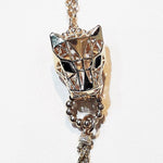 Load image into Gallery viewer, The panther is a symbol of power, beauty, grace and elegance. Our outstanding panther shape geometric-cut solid-gold necklace with mesmerizing white topaz gemstones will accompany you to trust yourself, live your dreams, and begin a new chapter as the power of the Panther guides and protects you.
